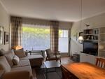 Foto vom Objekt Ferienwohnung Tidenhub (Nr. 4)  mit Strandkorb am Deich