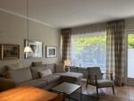 Foto vom Objekt Ferienwohnung Tidenhub (Nr. 4)  mit Strandkorb am Deich
