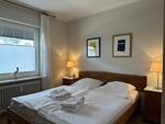 Foto vom Objekt Ferienwohnung Tidenhub (Nr. 4)  mit Strandkorb am Deich