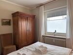 Foto vom Objekt Ferienwohnung Tidenhub (Nr. 4)  mit Strandkorb am Deich
